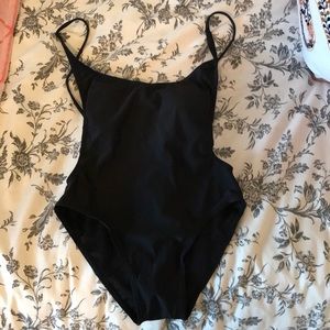 Black one piece bathing suit with low back